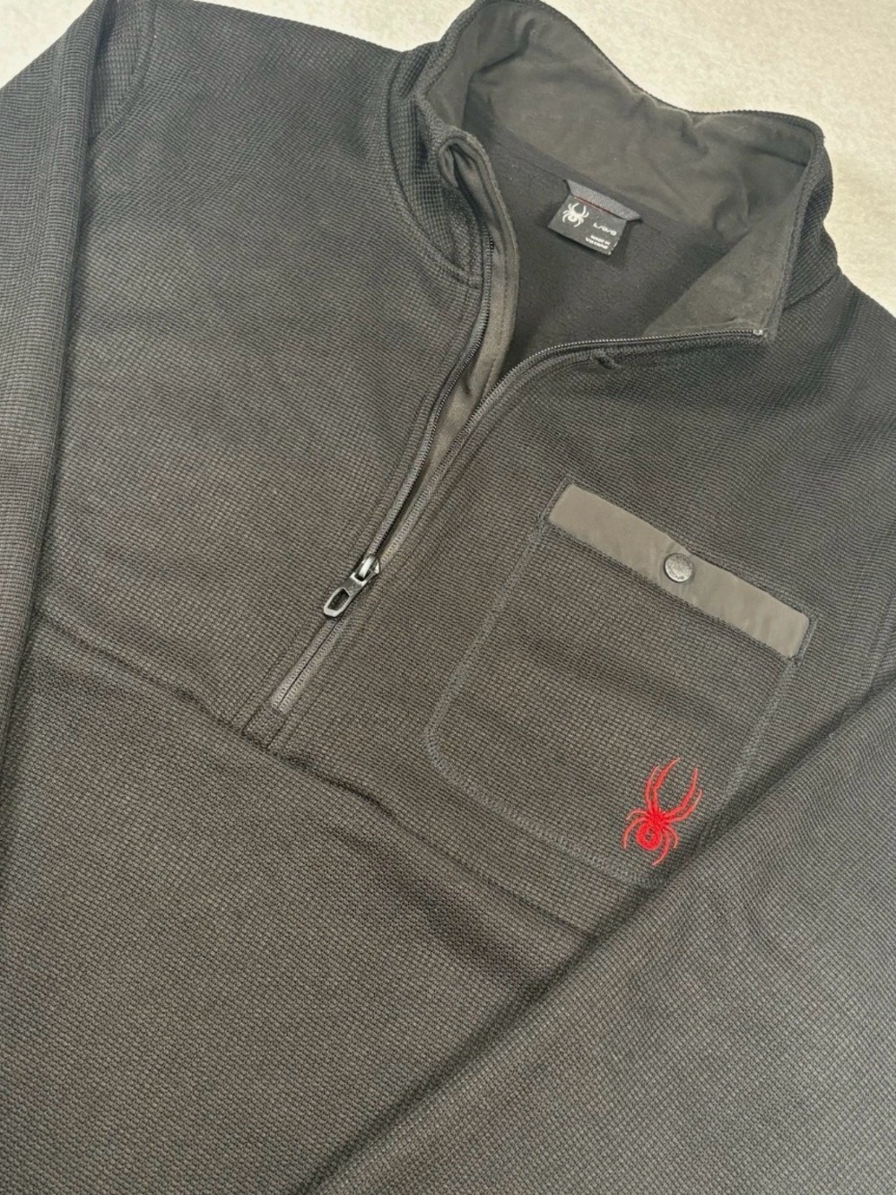 Spyder Men’s Black Half-Zip Sweater with Red Logo